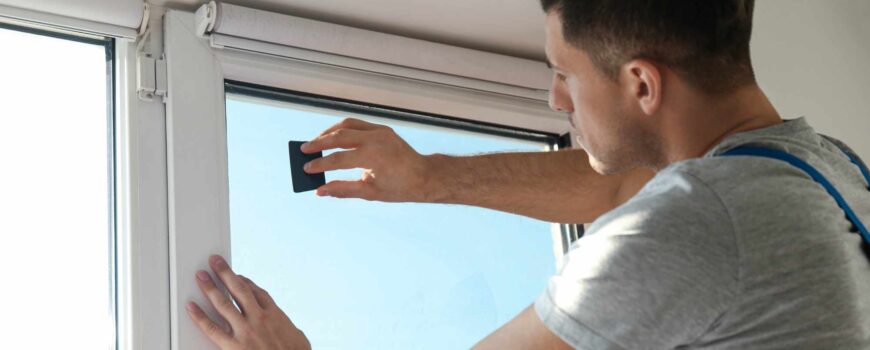 Professional,Worker,Tinting,Window,With,Foil,Indoors